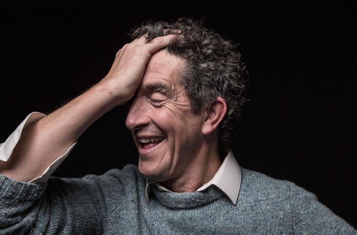 Robbie Ryan with 2025 THR Visionary in Cinematography Award at EnergaCAMERIMAGE 2025